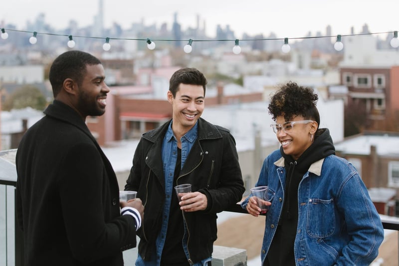 Friends-Laughing-Together-On-Rooftop-how-to-improve-emotional-intelligence