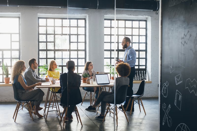 Group-of-a-business-people-having-meeting-in-a-conference-room-how-to-give-a-good-presentation