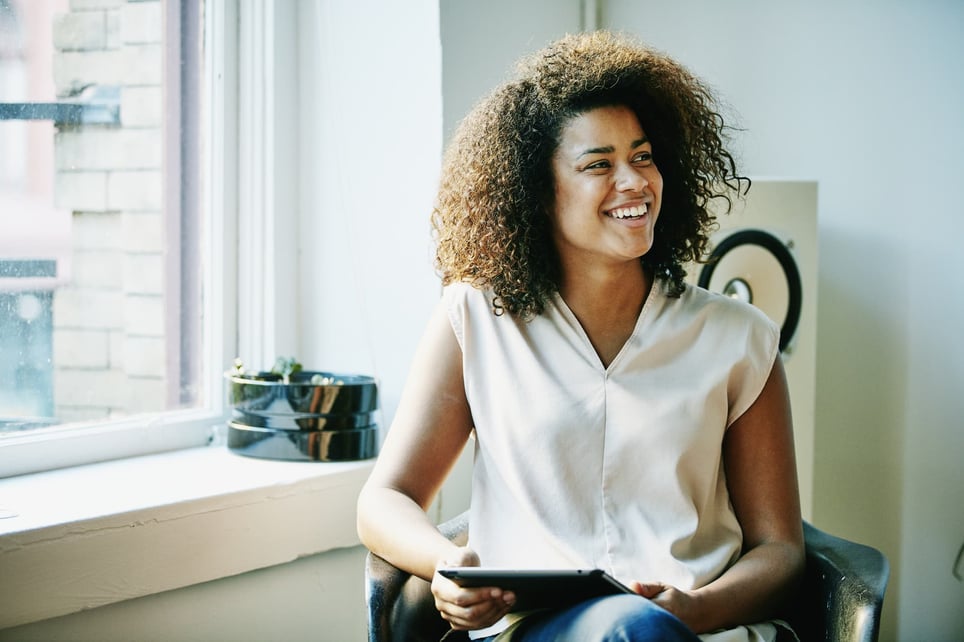 mixed-race-business-woman-smiling--how-to-be-more-persuasive